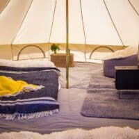 Inside 4m bell tent with stove hole